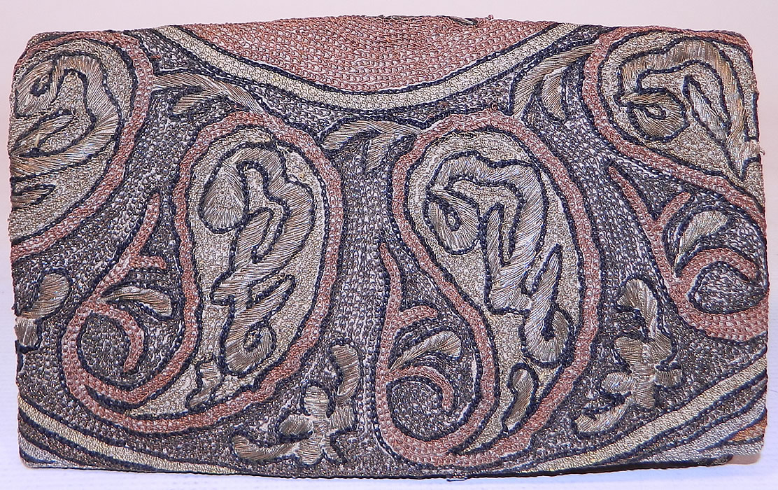 Antique Ottoman Turkish Tugra Chain Stitch Metal Thread Embroidery Clutch Purse
The purse measures 8 inches long and is 5 inches wide. It is in good condition. This is truly a wonderful piece of antique Ottoman Turkish textile art! 