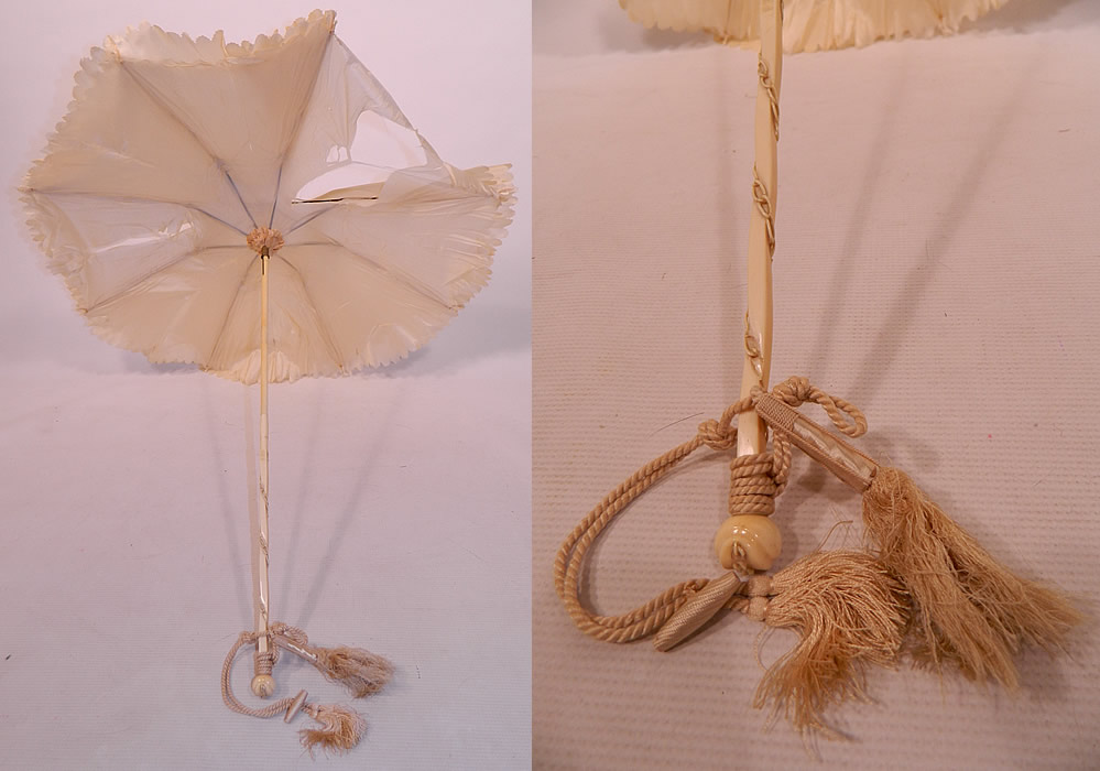 Victorian Cream Silk Carved Chain Link Wrapped Handle Parasol Tassel Trim
This pretty parasol has cream silk rope tassel trim wrapped and hanging down from the bottom.