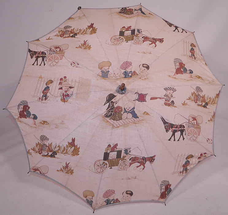 Vintage Chloe Preston Childrens Kewpie Illustration Print Linen Parasol
This vintage Chloe Preston children's Kewpie illustration print linen parasol dates from the 1920s.