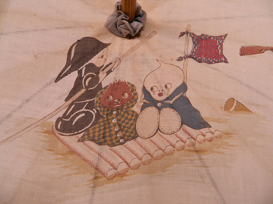 Vintage Chloe Preston Childrens Kewpie Illustration Print Linen Parasol
It is made of an off white linen fabric, with muted color cute snub nosed children Kewpie like and animals at play in adult guise illustrations by the British children's artist Chloe Preston. 