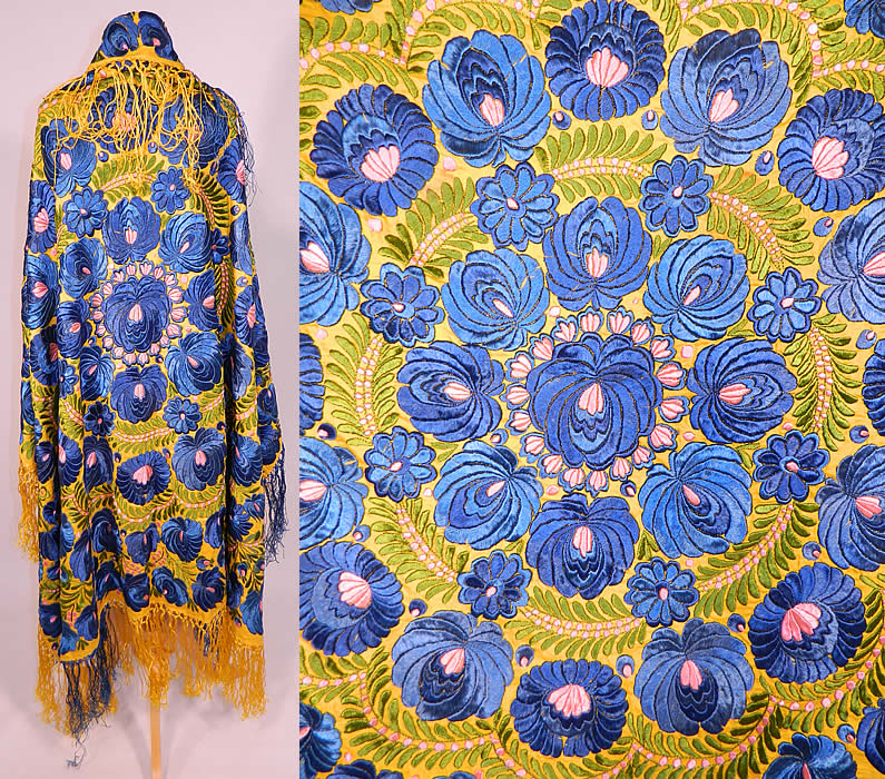 Antique Matyo Hungarian Folk Embroidery Fringe Large Square Shawl Tablecloth
This antique Hungarian Matyo folk embroidery fringe large square shawl tablecloth dates from the 1920s. It is hand stitched, made of a bright yellow linen cloth completely covered with blue, green and pink silk threads done in raised padded satin stitch Matyo embroidery work.