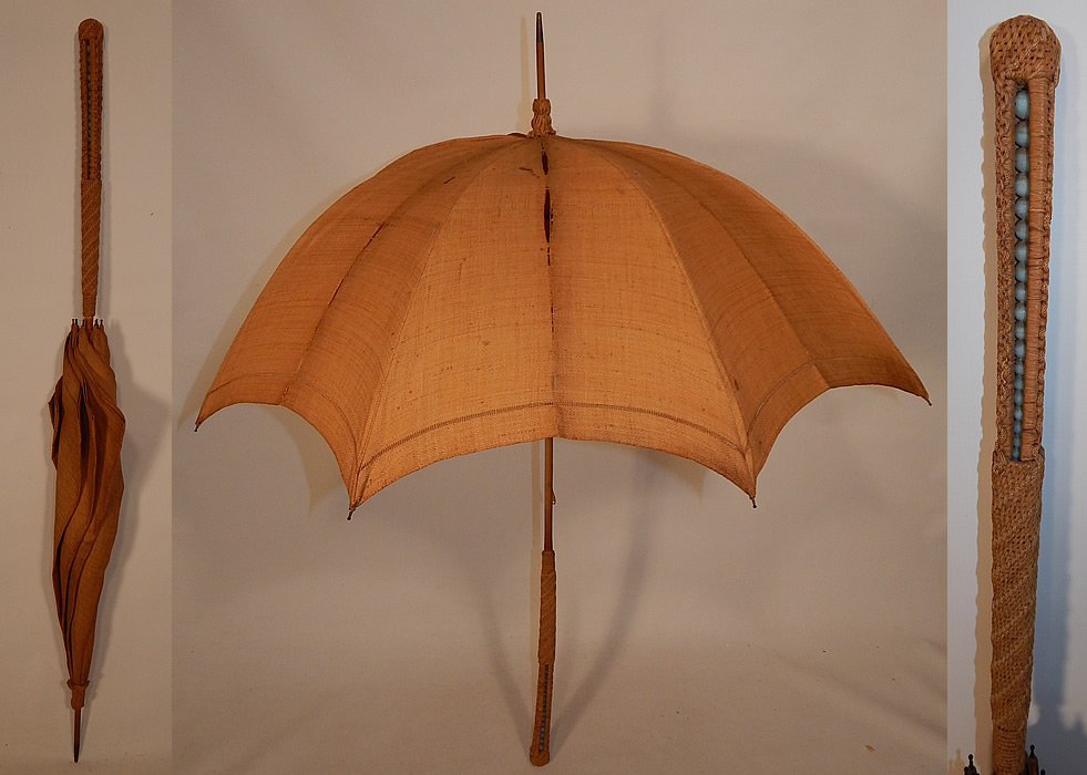 Edwardian Ecru Burlap Cloth Natural Straw Basketweave Handle Summer Parasol
This Edwardian era antique ecru burlap cloth natural straw basketweave handle summer parasol dates from 1910. It is made of an ecru natural linen color coarse cloth burlap fabric.