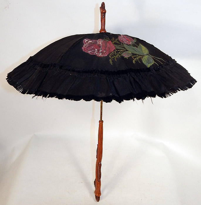 Victorian Black Silk Hand Painted Roses Grape Leaf Wood Carved Handle Parasol
This is truly a wonderful piece of ladies antique Victoriana parasol art!