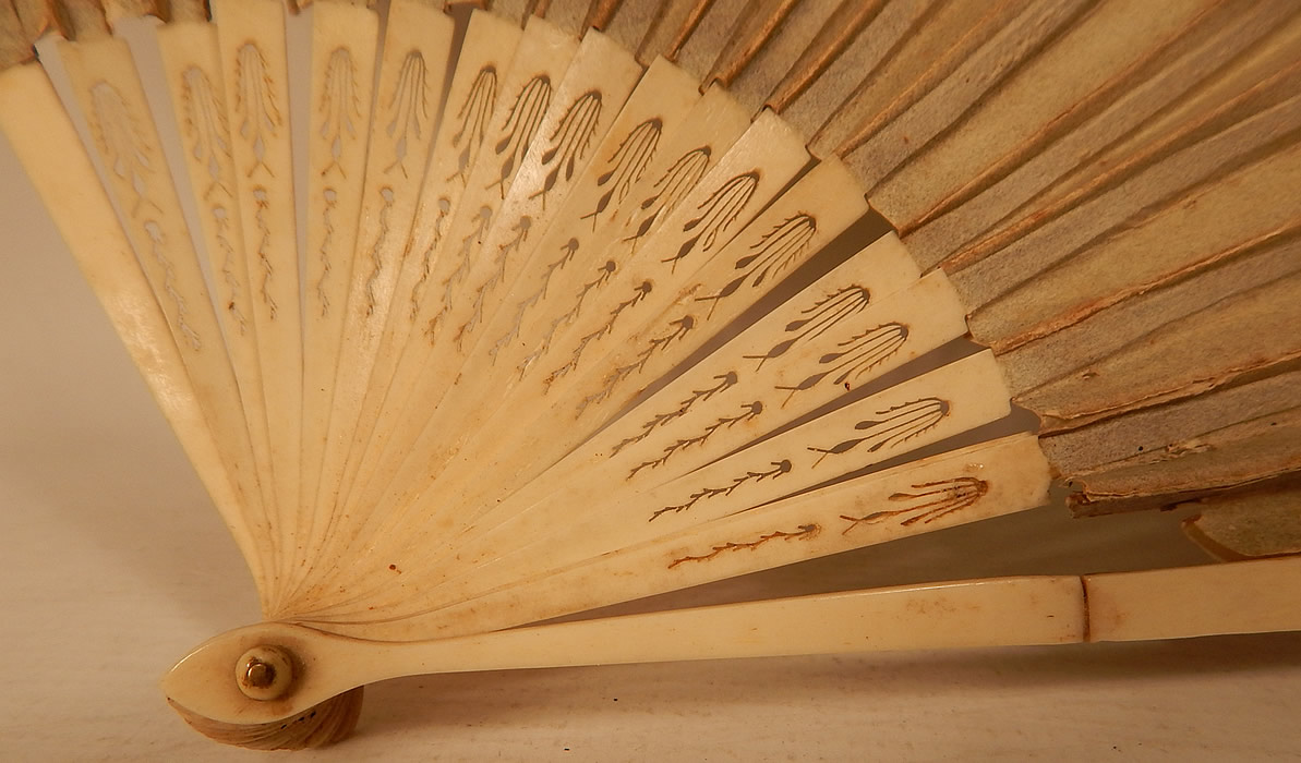 Antique 18th Century Hand Painted Paper Sequin Pierced Carved Folding Fan & Box
This fabulous folding fan has a carved and pierced bone sticks and guards and rivet holding the fan together at the bottom. 