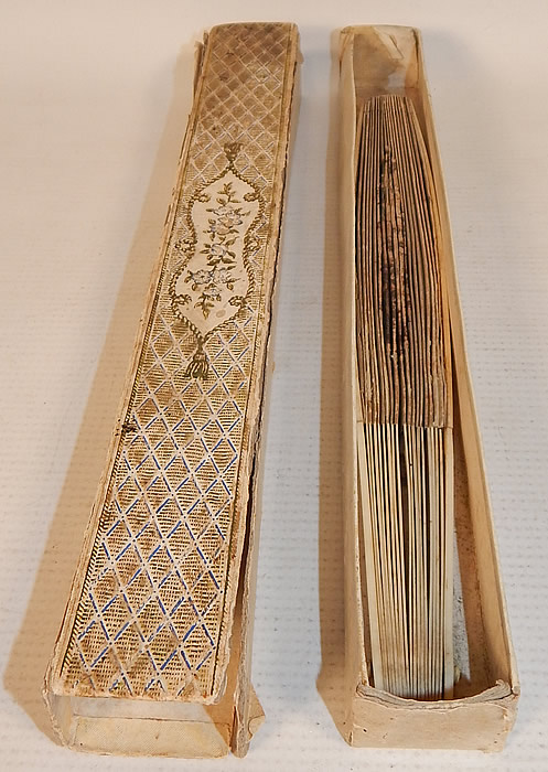 Antique 18th Century Hand Painted Paper Sequin Pierced Carved Folding Fan & Box
The fan measures 9 1/2 inches long and 16 inches wide when opened . It comes with the decorative gold embossed paper box which slides open to reveal the fan inside. 