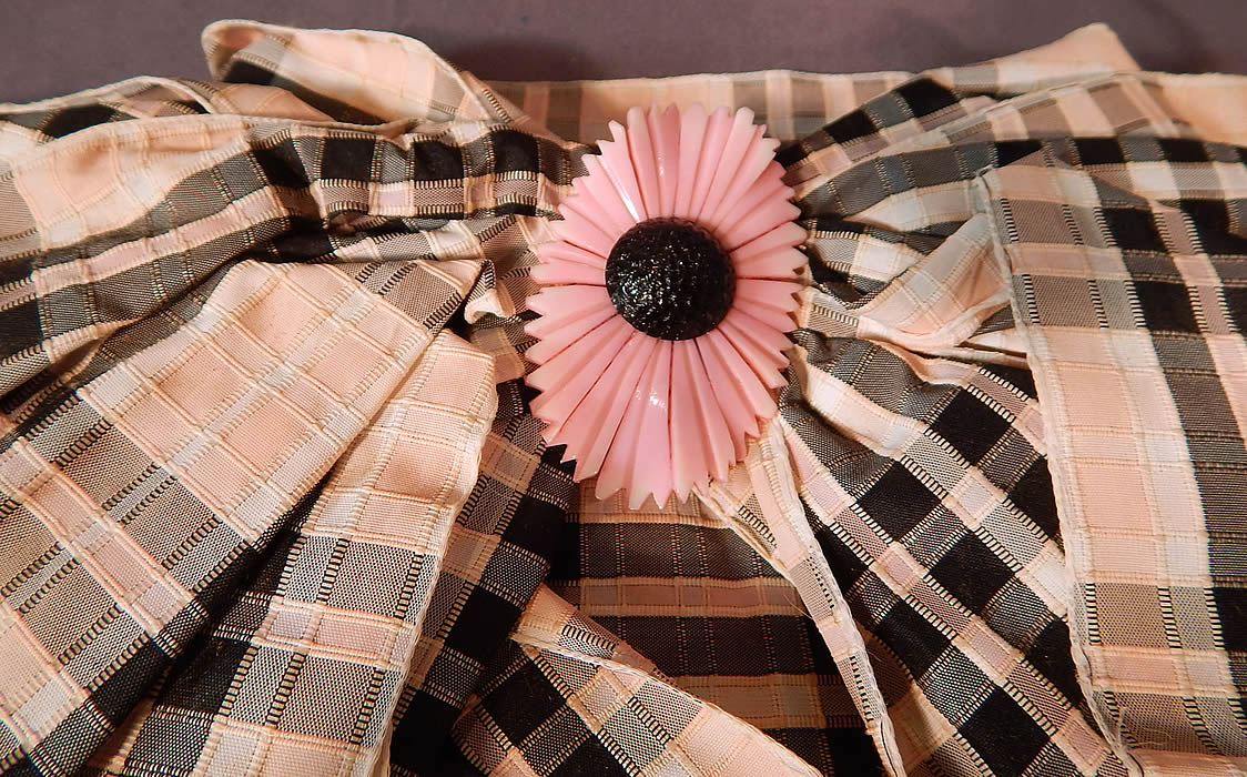 Vintage Paris France Pink & Black Plaid Check Silk Ribbon Bow High Neck Collar
It comes in the original shipping box from Paris France, dated with a 1935 post mark on the back. The bow measures 11 inches wide, with 6 inch wide neck ribbon, a 16 inch neck circumference and 2 inch pin clasp. It is in excellent condition and appears to have never been worn. This is truly a wonderful piece of Victorian inspired textile art! 