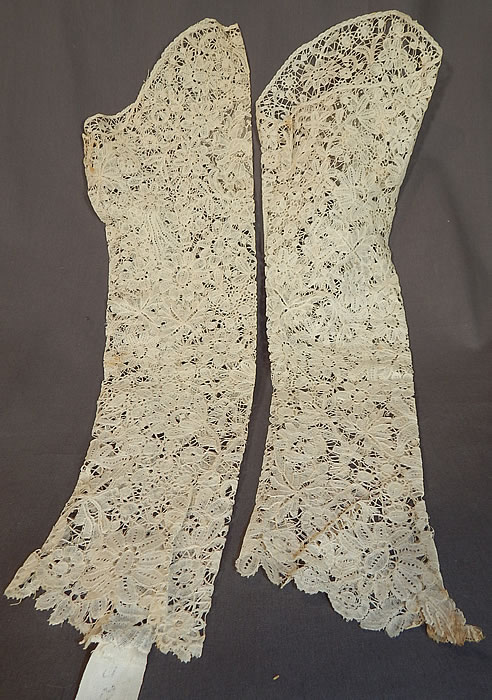 Antique Hand Made Brussels Point de Gaze Duchesse Bobbin Lace Dress Sleeves
This lovely lace pair of bridal wedding gown dress sleeves are a long arm length with a wide scalloped finished edge opening at the top, fitted lace scalloped edge cuffs and is sheer, unlined. 