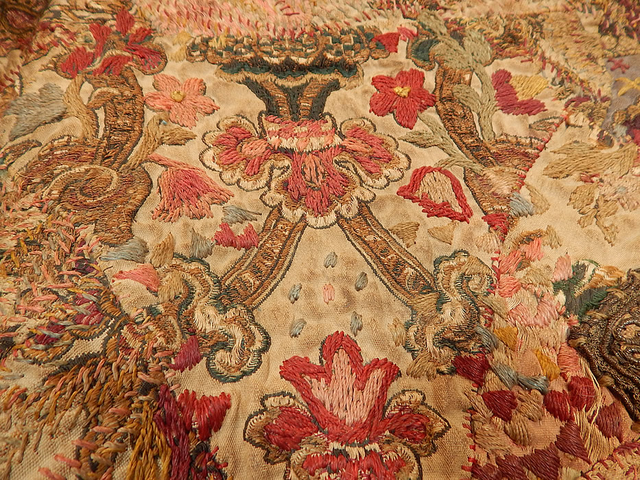 Antique 18th Century Textile Embroidered Patchwork Gold Bullion Round Tablecloth
The round tablecloth table cover measures 32 inches wide, with 3 1/2 inch fringe trim edging. 
