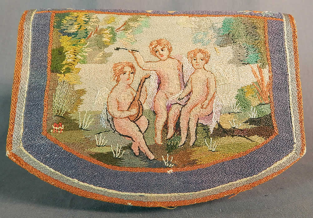 Vintage Angelic Cherub Cupid Petit Point Needlepoint Embroidered Clutch Purse
This vintage angelic cherub cupid petit point needlepoint embroidered clutch purse dates from the 1920s. 