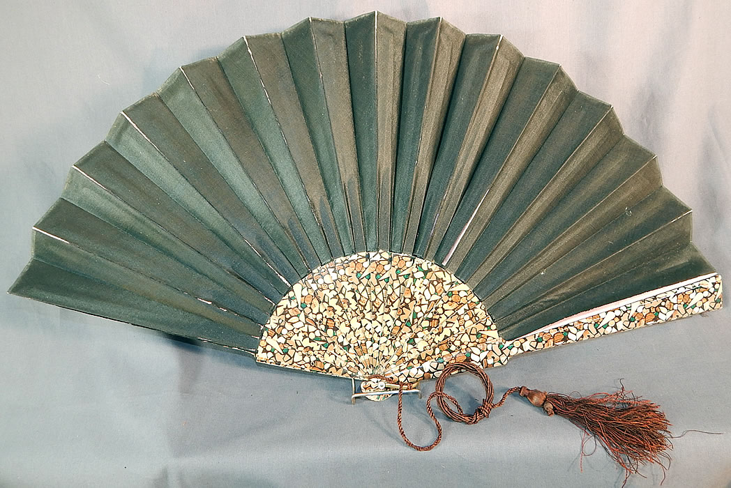 Victorian Black Silk Hand Painted Magnolia Chickadee Birds Decoupage Folding Fan
The fan measures 14 inches long and is 25 inches wide when open. 