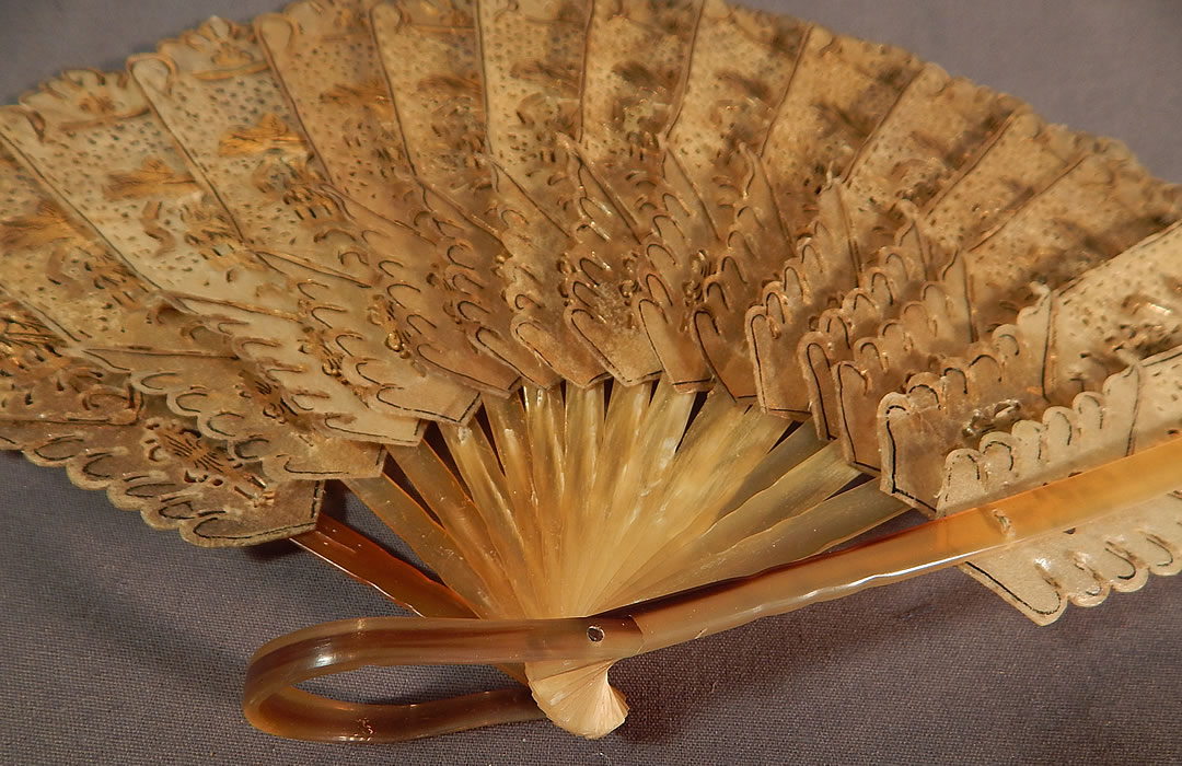 Antique Indonesia Java Wayang Shadow Puppet Gold Painted Pierced Folding Fan
The fan measures 8 inches long and 14 inches wide when opened. It is in excellent condition. This is truly a wonderful piece of Javanese fan art! 