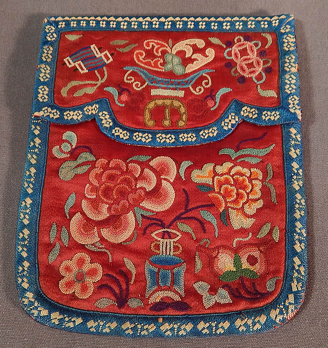 Antique Chinese Cinnabar Silk Forbidden Stitch Embroidery Pouch Purse Small Bag
This antique Chinese cinnabar silk forbidden stitch embroidery pouch purse small bag dates from the late 19th century during the Qing Dynasty. It is hand stitched, made of a cinnabar color silk fabric, with colorful forbidden stitch tiny seed stitch hand embroidery work of peony flowers, butterflies and precious objects.