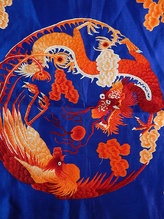 Antique Chinese Dragon Phoenix Yin Yang Silk Embroidered Fabric Square Badge
It is made of a bright royal blue silk fabric, with varying shades of ombre orange to red silk raised padded satin stitch hand embroidery work. 
