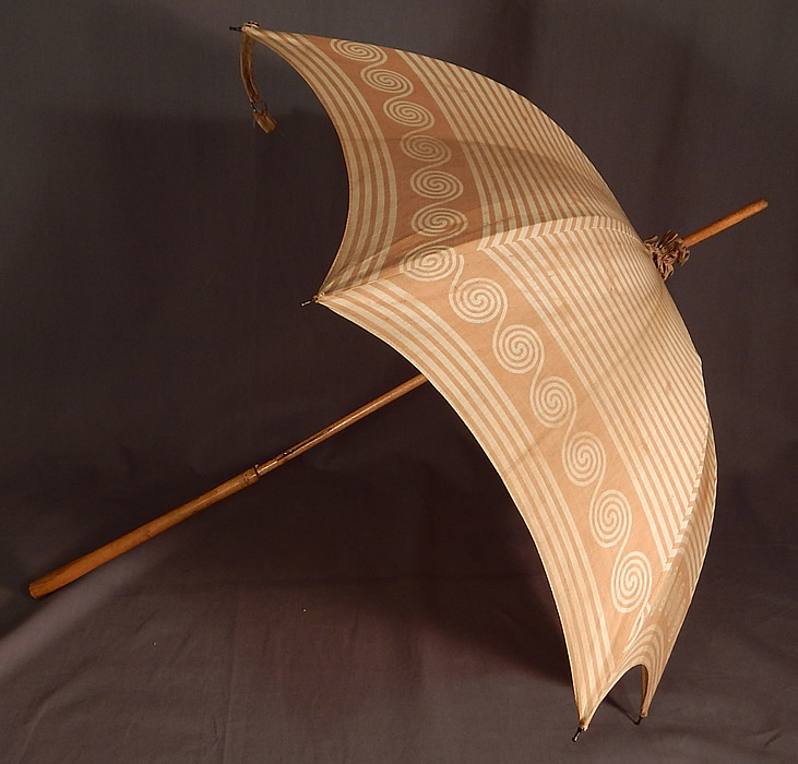 Victorian Brown Spiral Striped Cotton Wood Handle Summer Beach Parasol
The parasol measures 31 inches long and 87 inches in circumference when opened. 