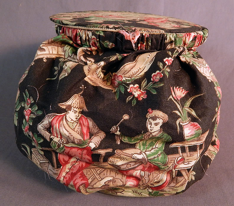 Vintage Antique Chinese Chinoiserie Chintz Print Round Sewing Bag Pouch Purse

This pretty pouch purse style sewing bag has a round shape with fabric covered cardboard lid top and bottom, is fully lined and has not closures or carrying straps.