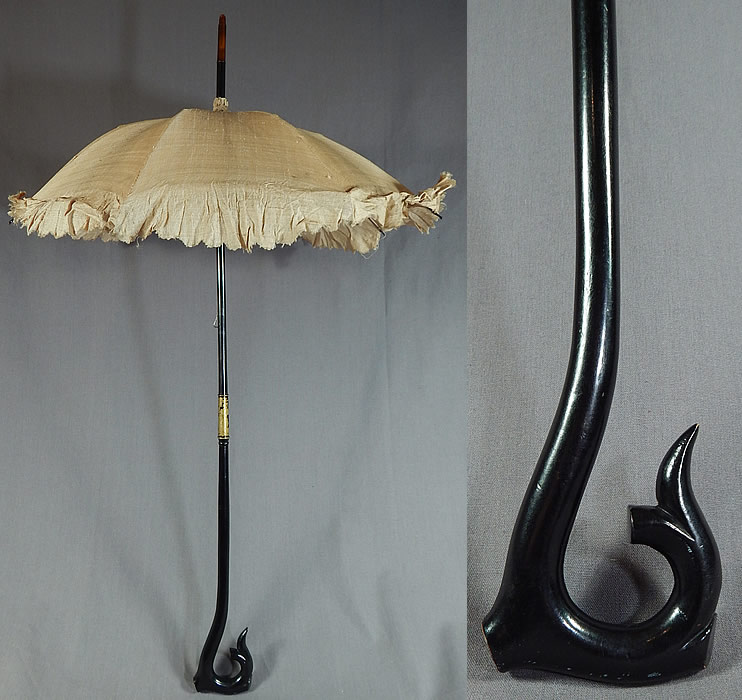 Victorian Civil War Pongee Raw Silk Folding Ebony Handle Marquis Parasol
There is a black ebony wood carved handle and folding shaft, with a marquis tilt top mechanism inside to keep the sun off your face and is unlined.