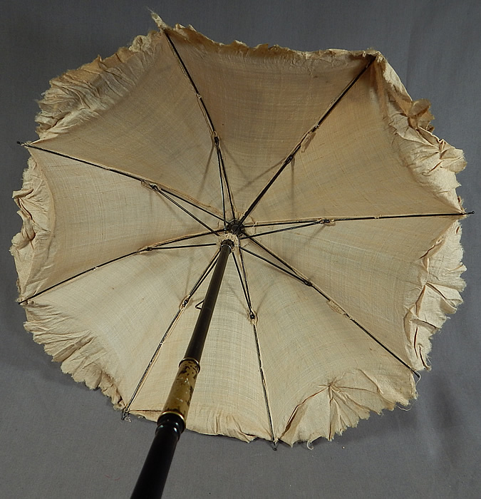 Victorian Civil War Pongee Raw Silk Folding Ebony Handle Marquis Parasol
The parasol measures 28 inches long extended, 16 inches long when folded and the fabric outside is 53 inches in circumference when opened up.