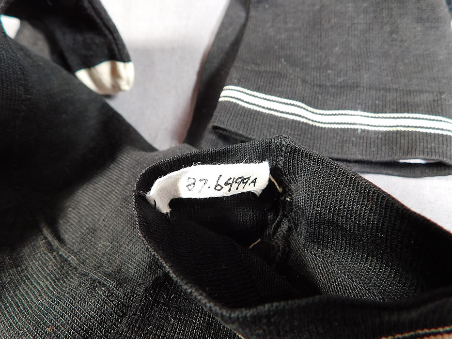 Victorian Black & White Silk Knit Childrens Knee High Socks Stockings
They are in excellent unworn condition and are a museum deaccession with numbered tag sewn inside.