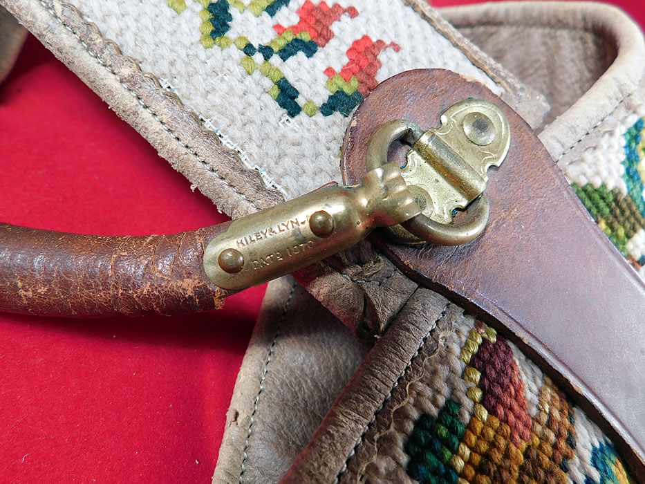 Victorian Antique Riley & Lyn Patent 1870 Needlepoint Leather Strap Bedroll
The needlepoint straps measure 2 1/2 inches wide, 16 inches long and is 12 inches across the top handle.