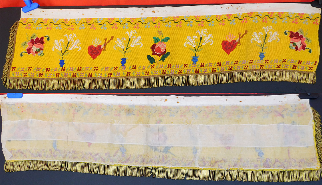 Antique Religious Catholic Altar Cloth Valance Needlepoint Embroidery Sacred Heart
It is made of a bright yellow hand embroidered needlepoint work with a colorful decorative pattern border edging, red roses, white lilies and the Sacred Heart of Jesus motif. 